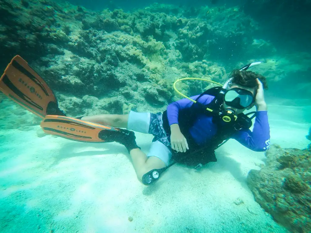 Landon Riddle scuba dives off the coast of Florida